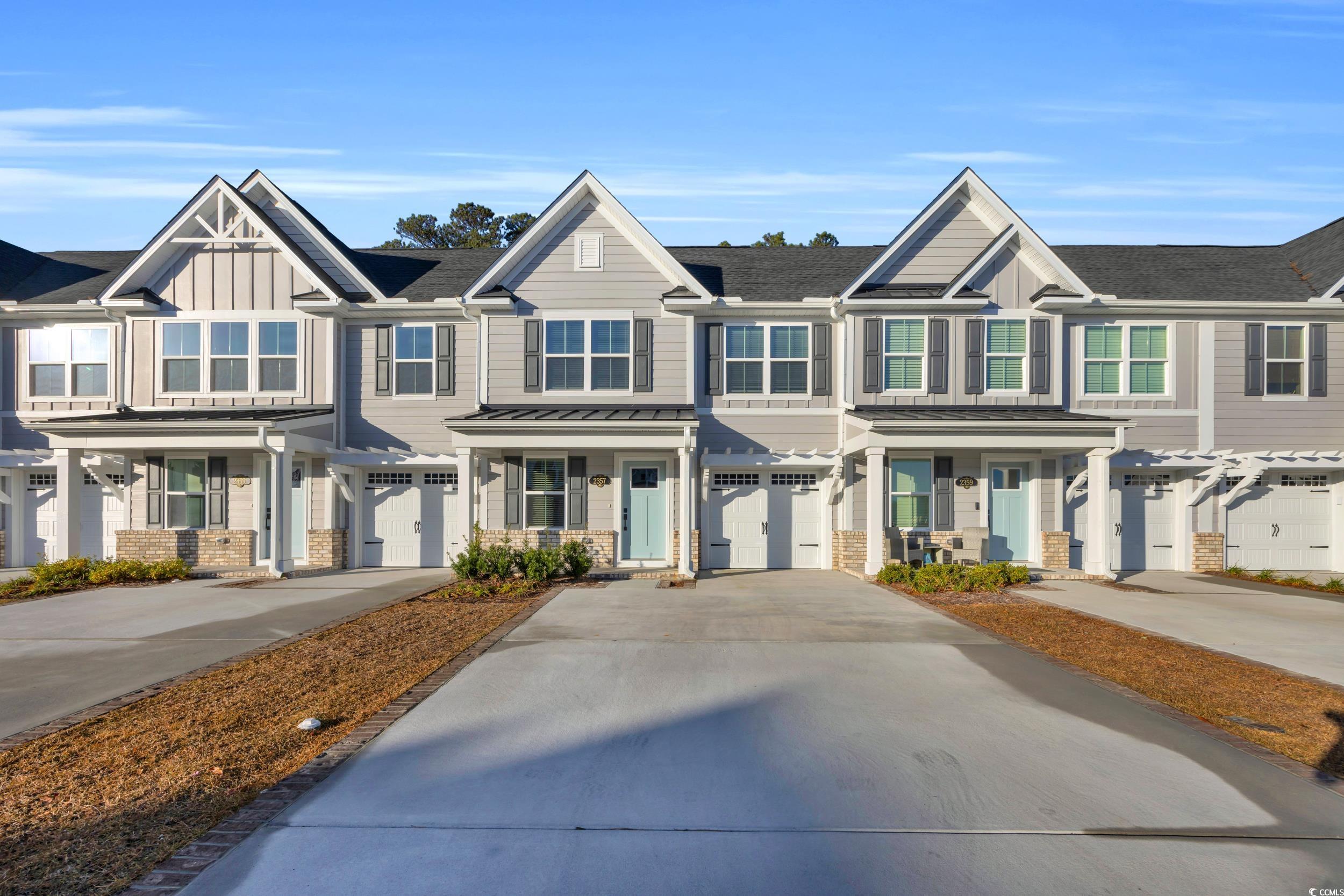 Multi unit property featuring a garage