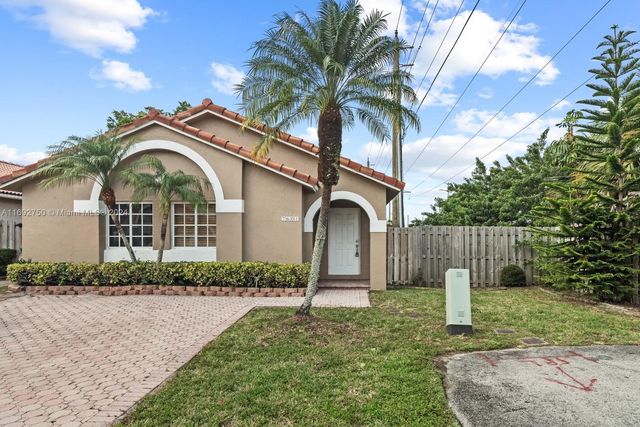 $595,000 | 7601 Northwest 166th Terrace | Country Club of Miami