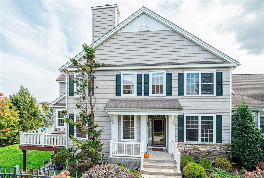 View of front of property featuring a deck