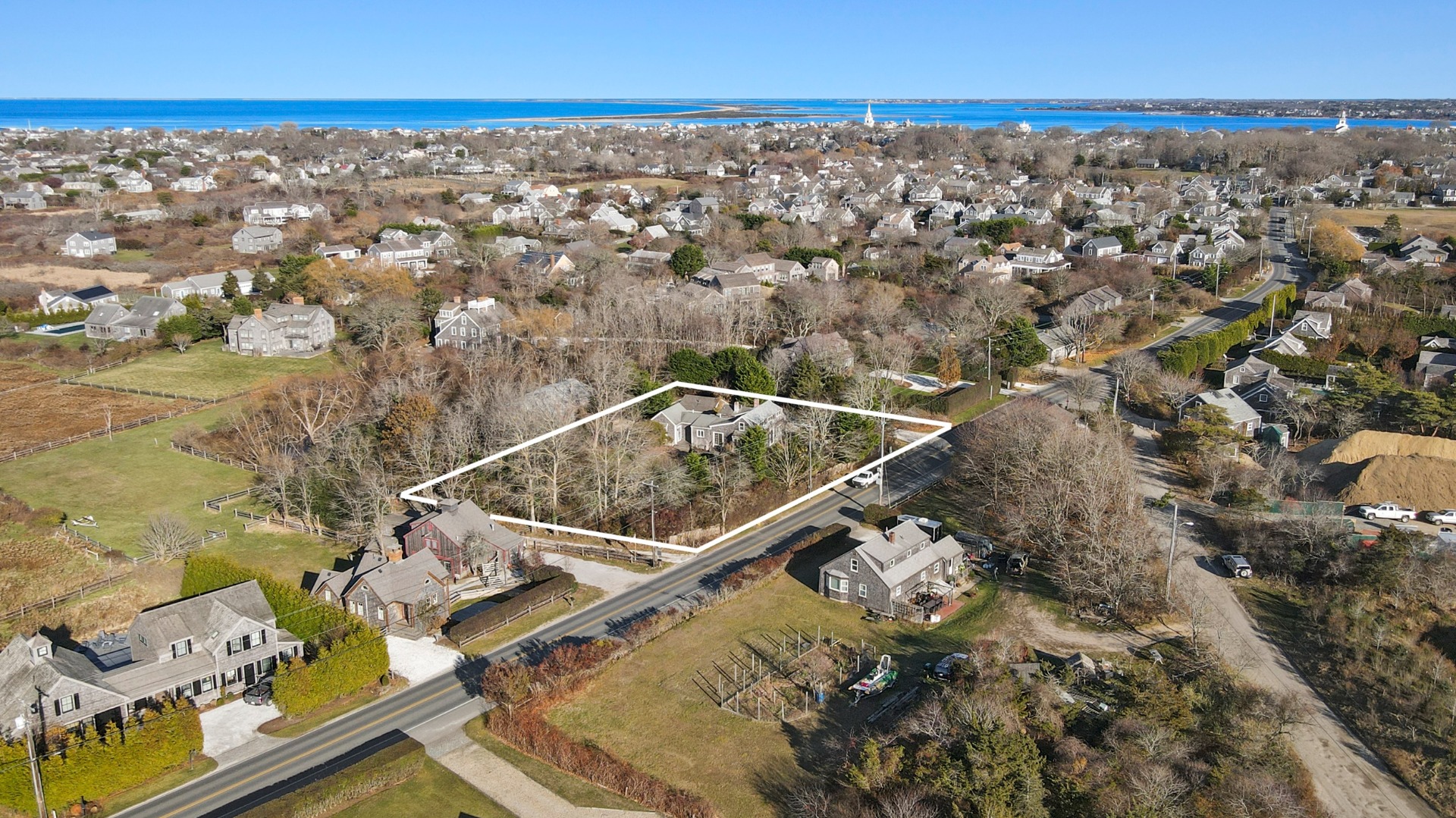 an aerial view of residential houses with outdoor space