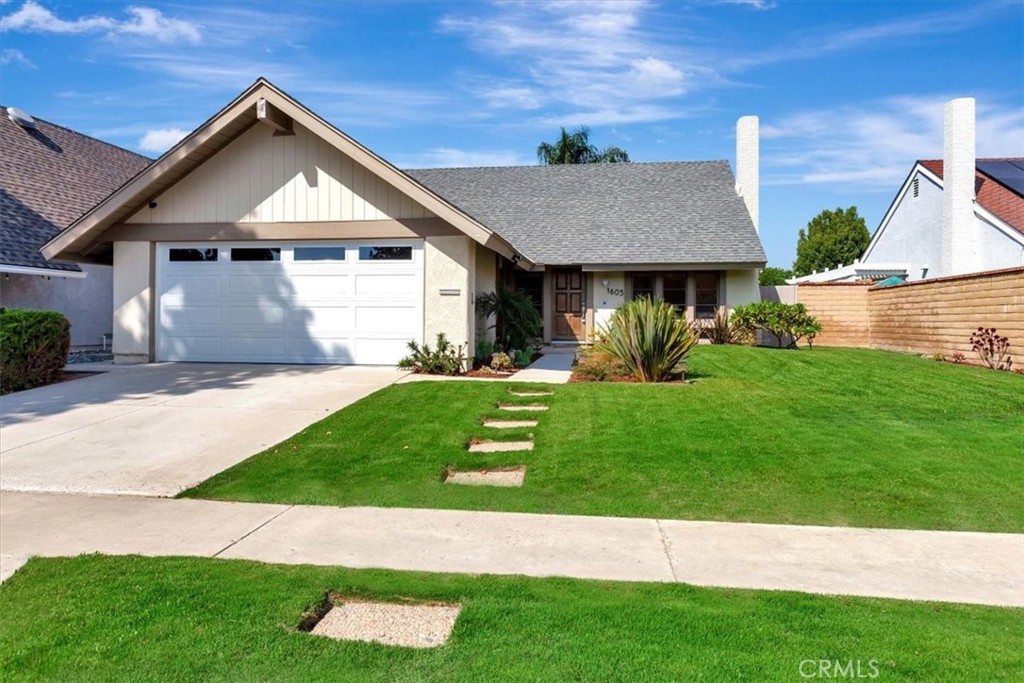 a view of outdoor space yard and front view of a house