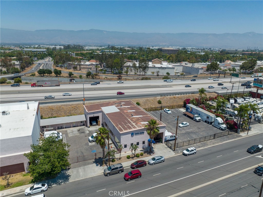 an aerial view of a building with outdoor space