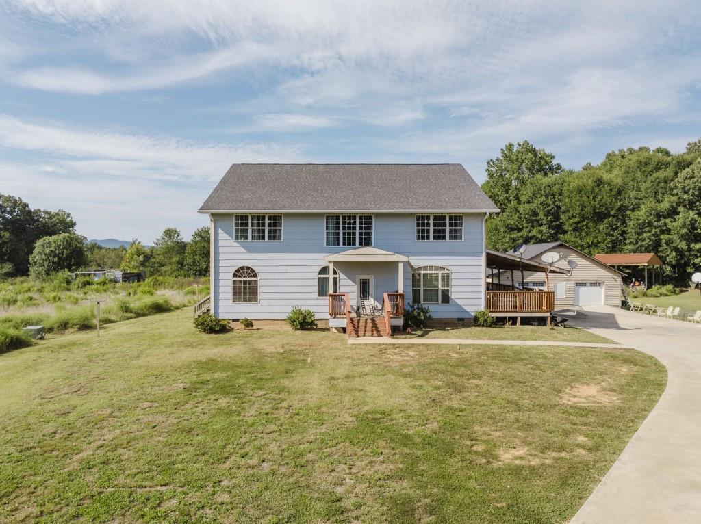 front view of a house with yard