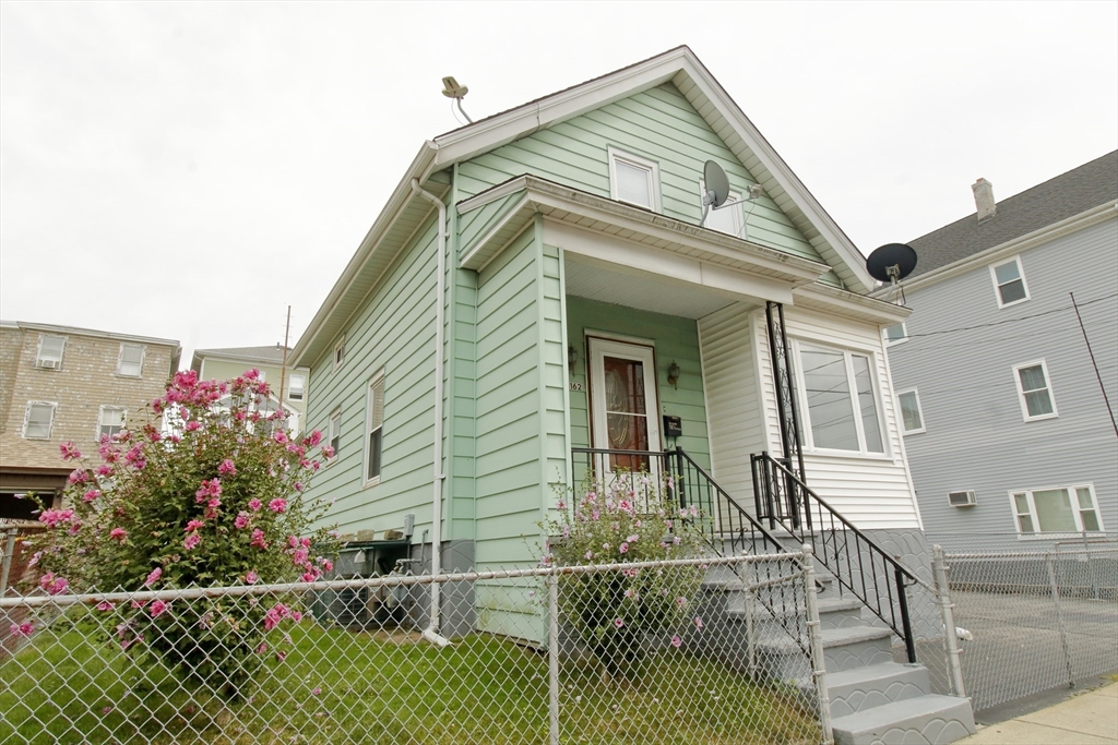 a view of a house with a porch