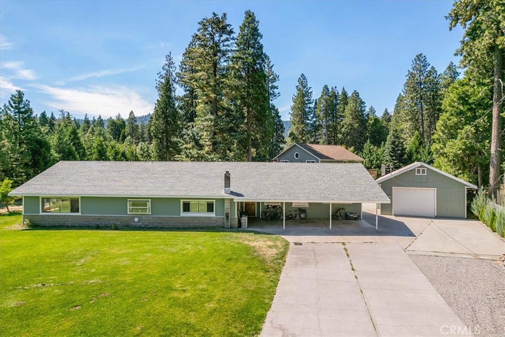 a aerial view of a house with a garden