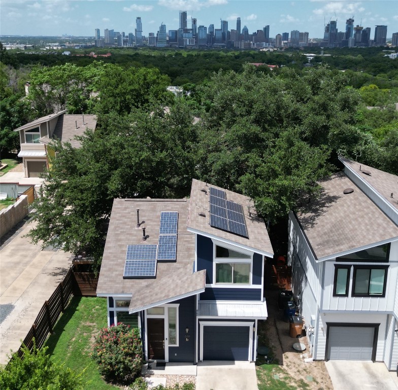 an aerial view of a house with a garden