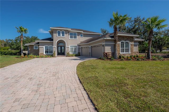 $799,900 | 21212 Ski Way | Land O' Lakes