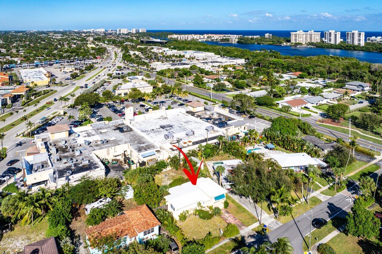 an aerial view of residential building and trees