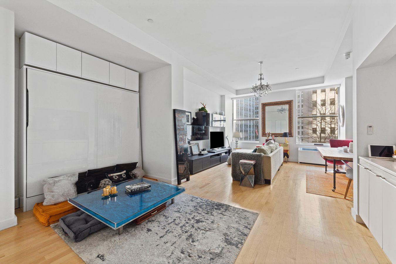 a living room with furniture rug and window