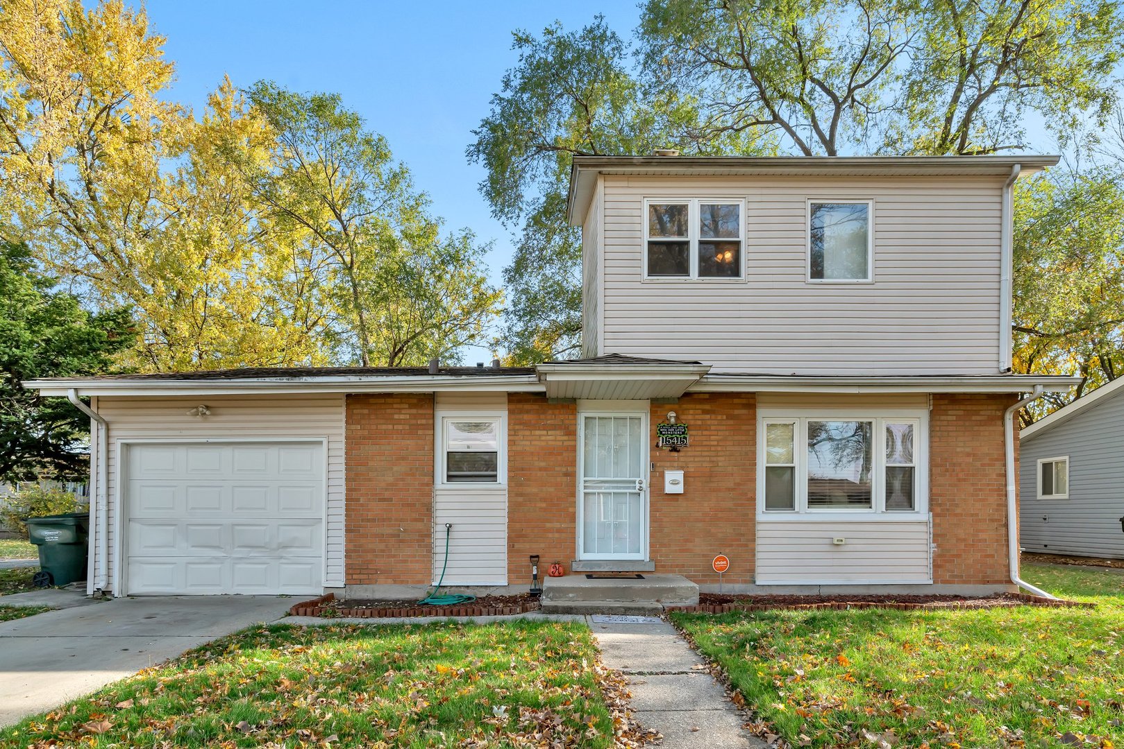 front view of house with a yard