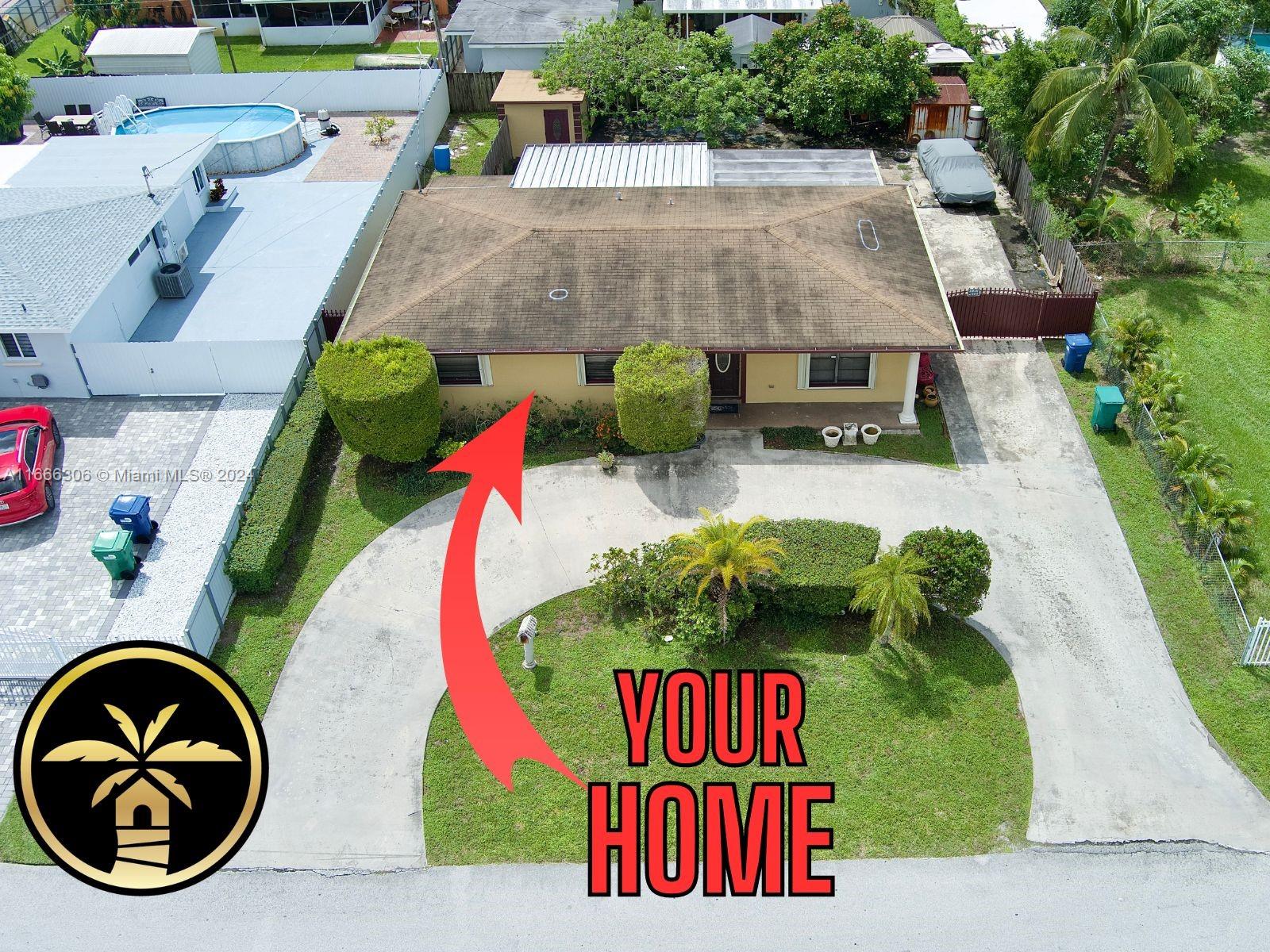 an aerial view of a highlighted house