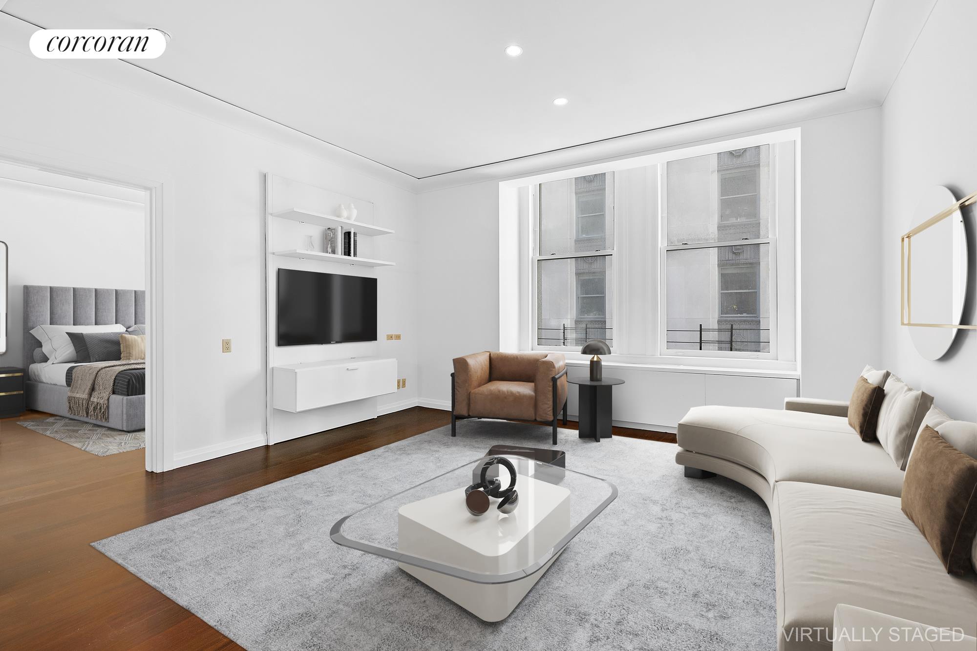 a living room with furniture and a flat screen tv