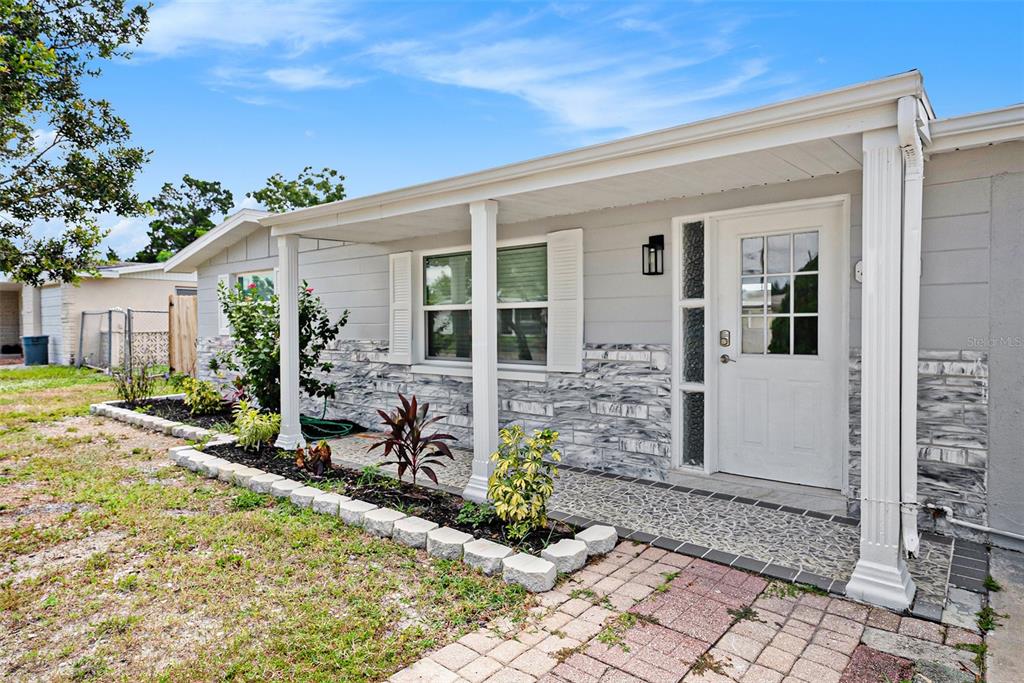 a view of house with patio