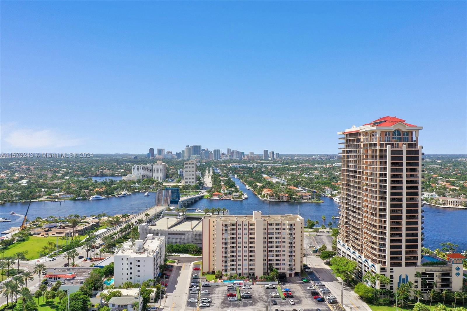 a view of a city with tall buildings