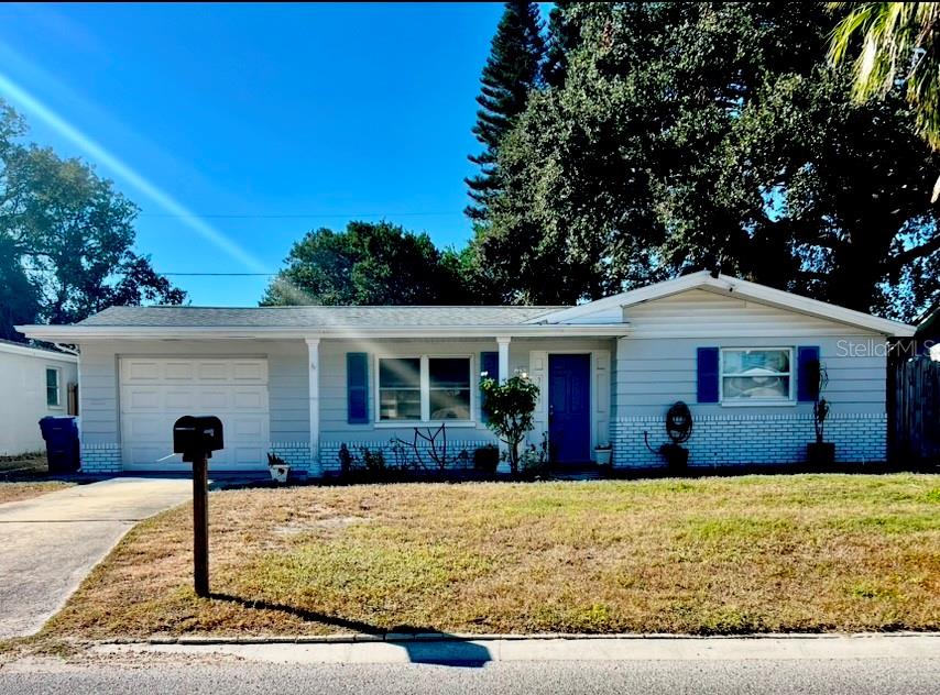 a front view of a house with yard