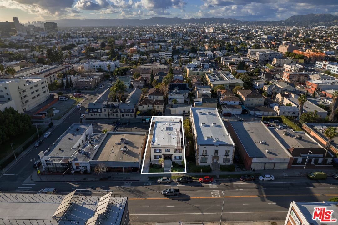 an aerial view of a city with lots of residential buildings