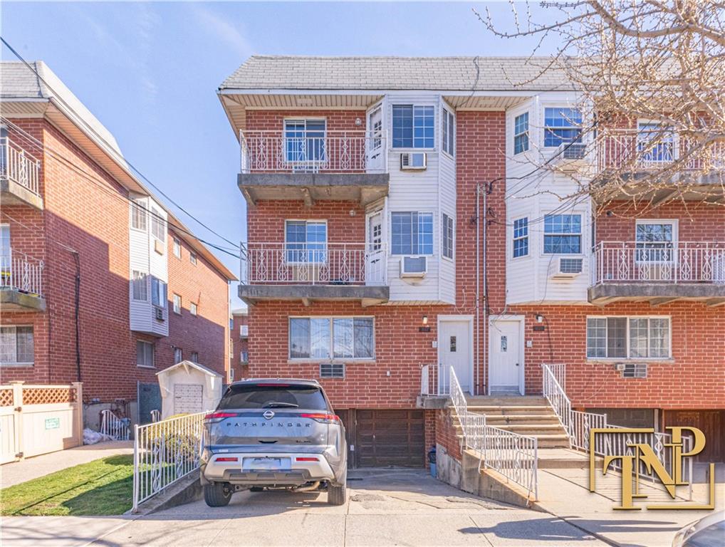 a front view of a multi story residential apartment building