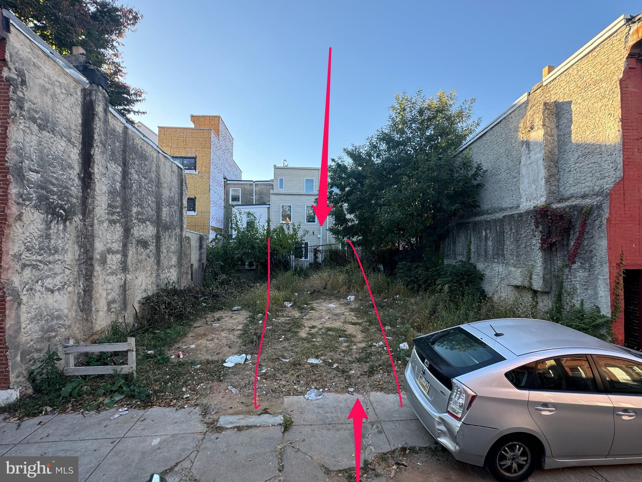 a car parked in front of a house