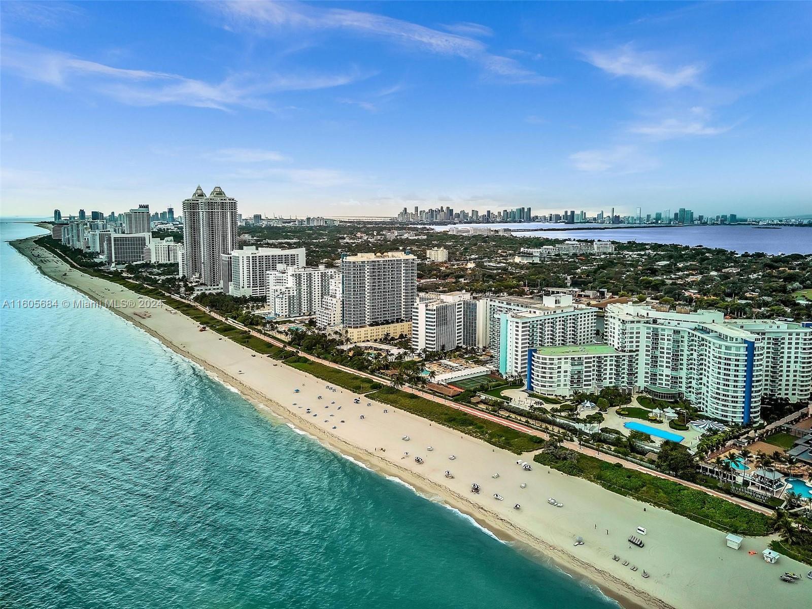 a view of a city with tall buildings