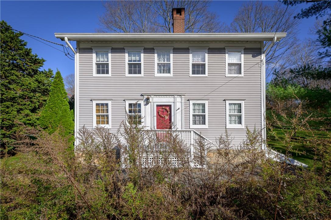 a view of a house with window and garden