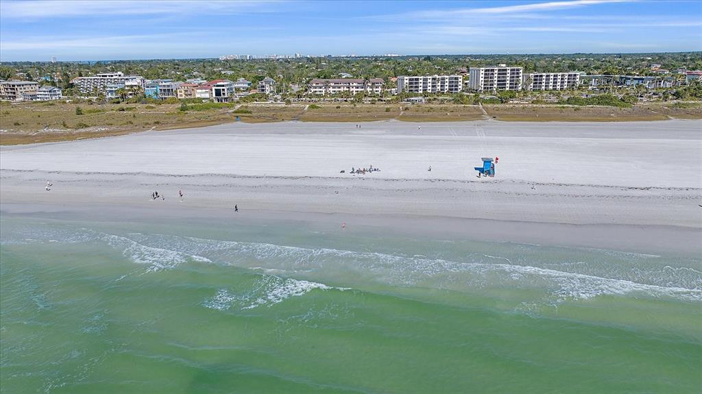 a view of an ocean and city