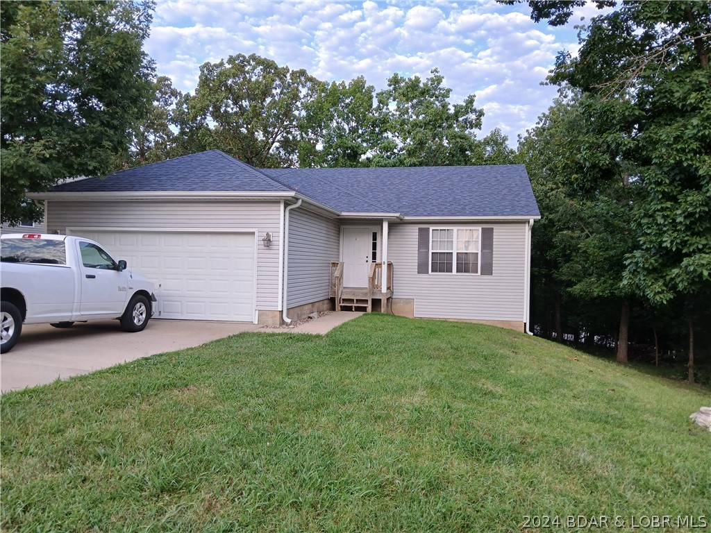 Flat driveway with the nice 2 car garage ~