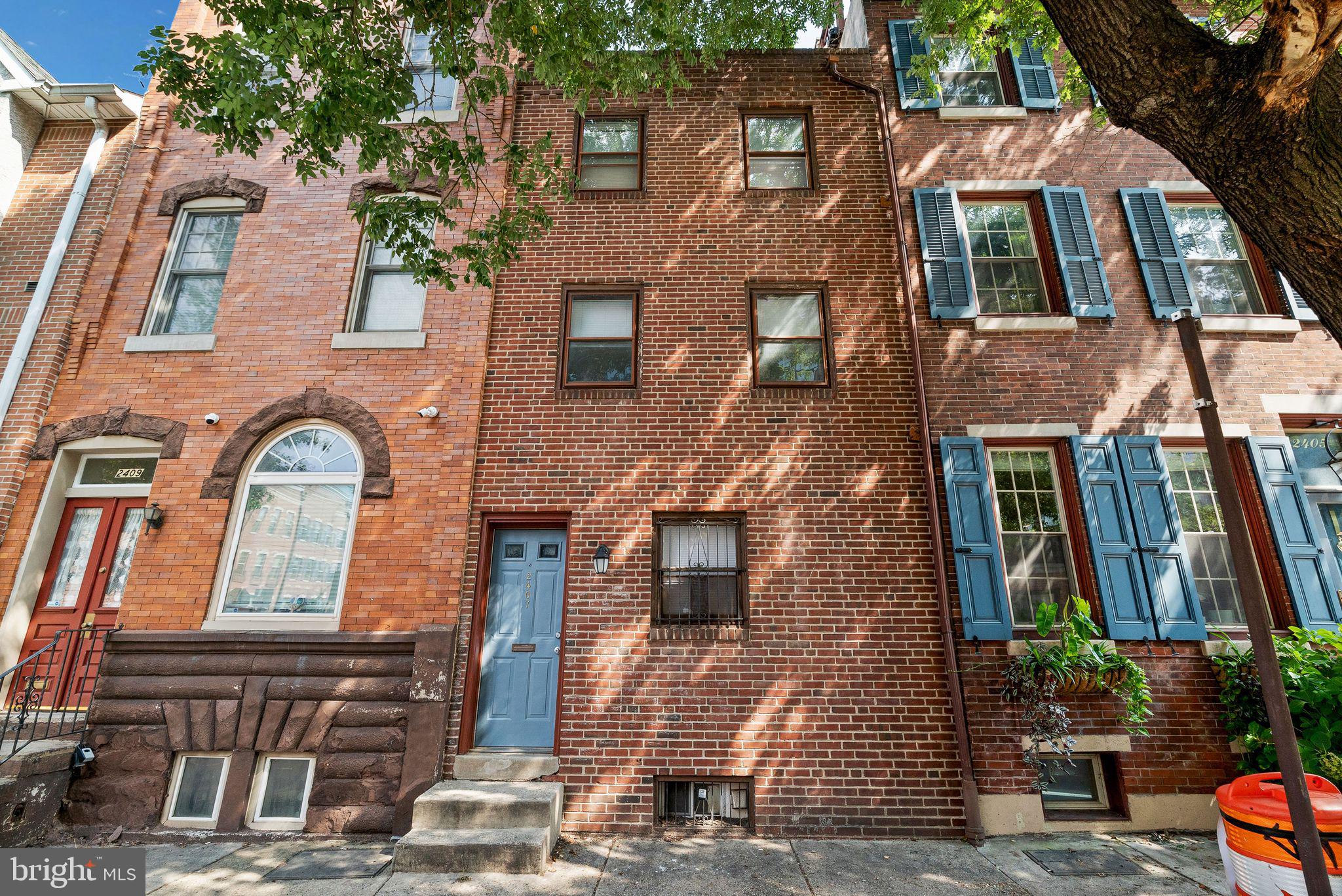 a front view of a multi story residential apartment building