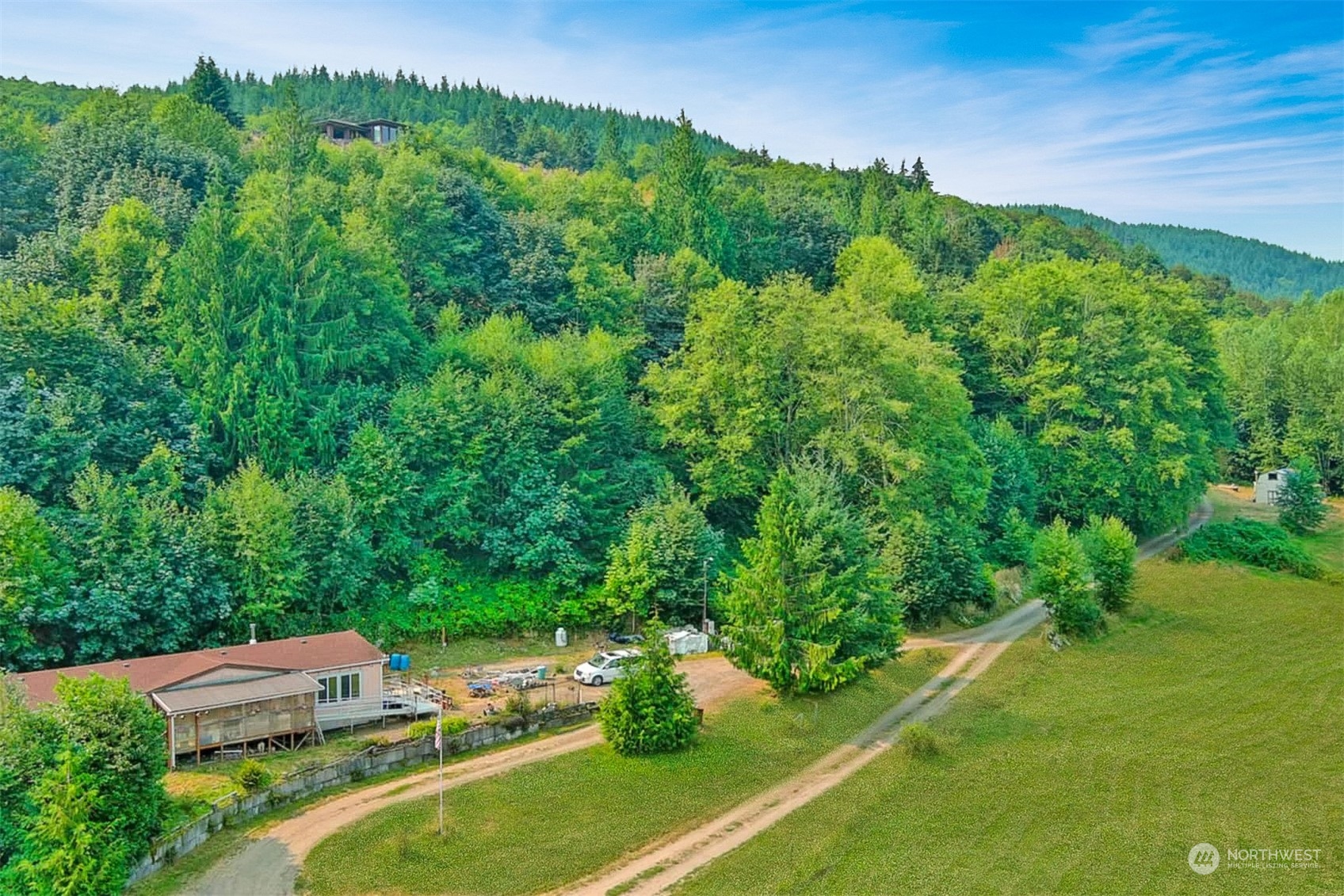 a view of backyard with green space