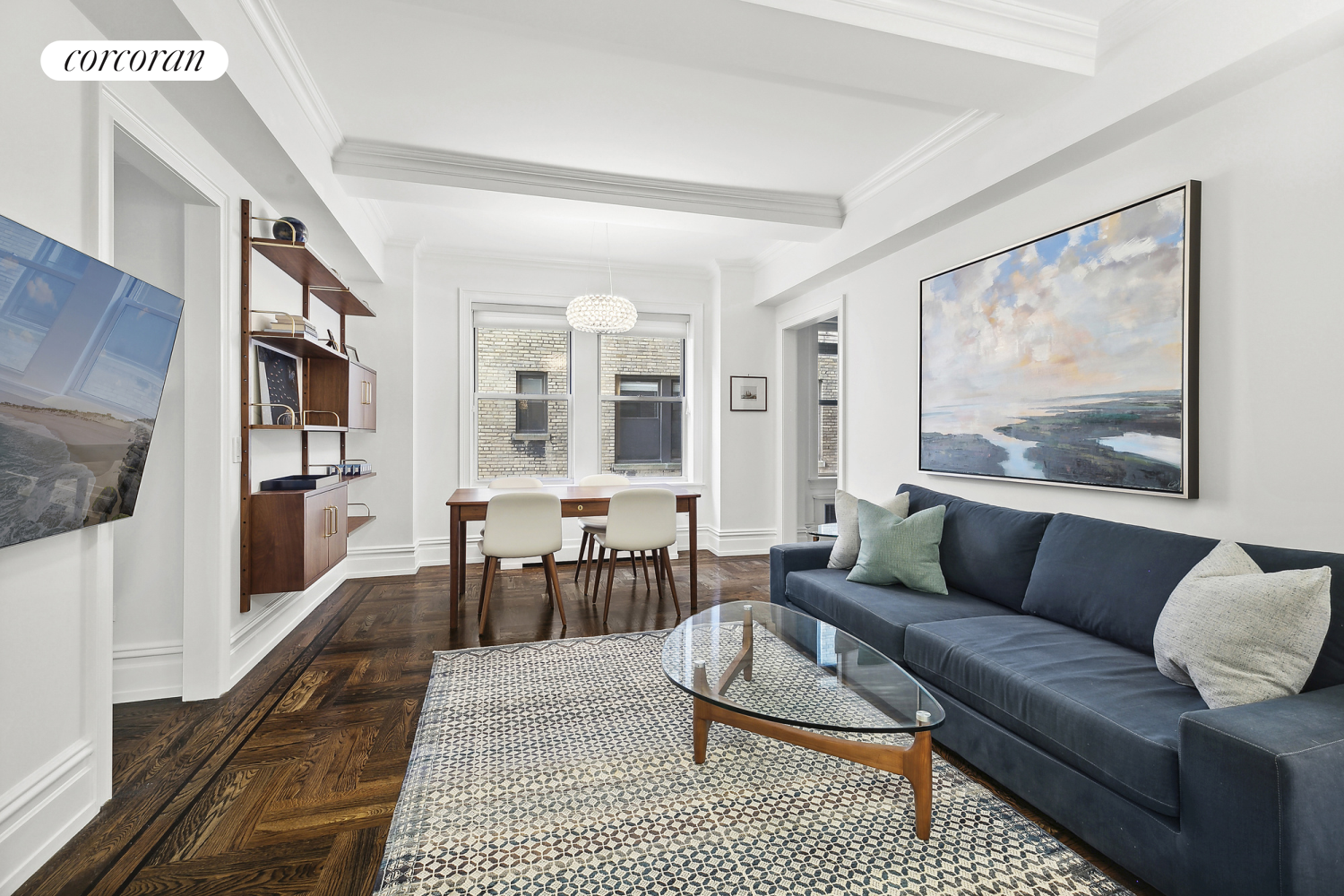 a living room with furniture and a rug