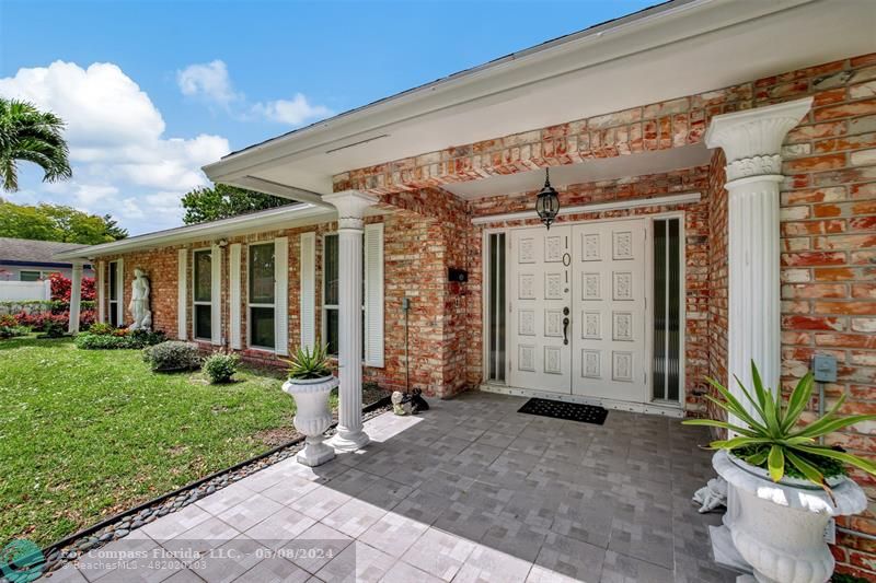 a front view of a house with a porch