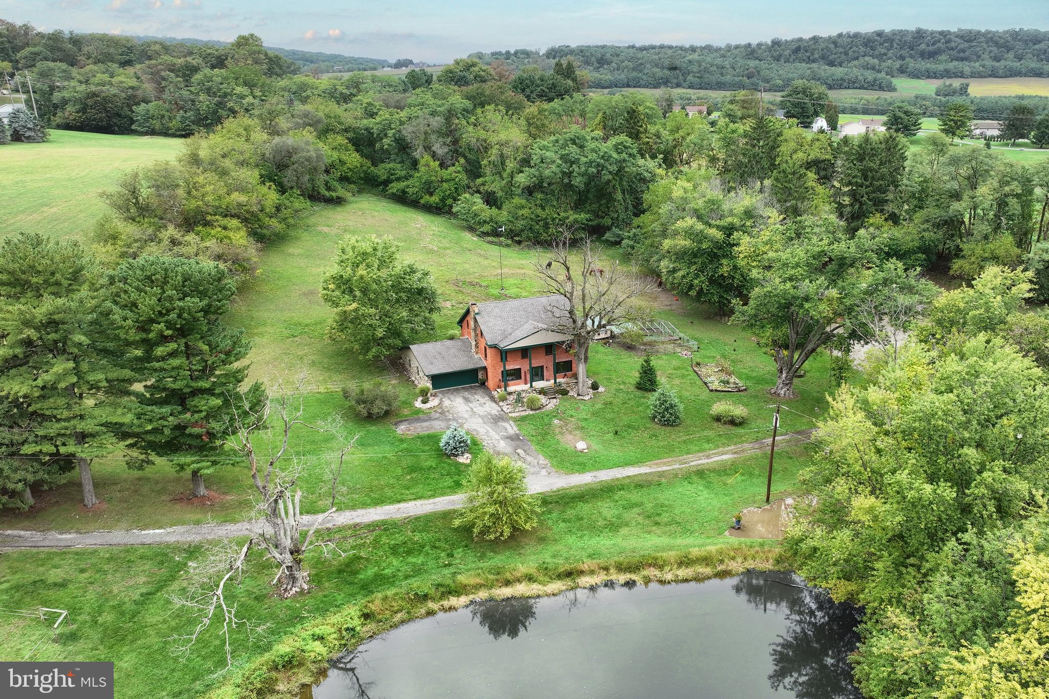 a view of a lake with a yard