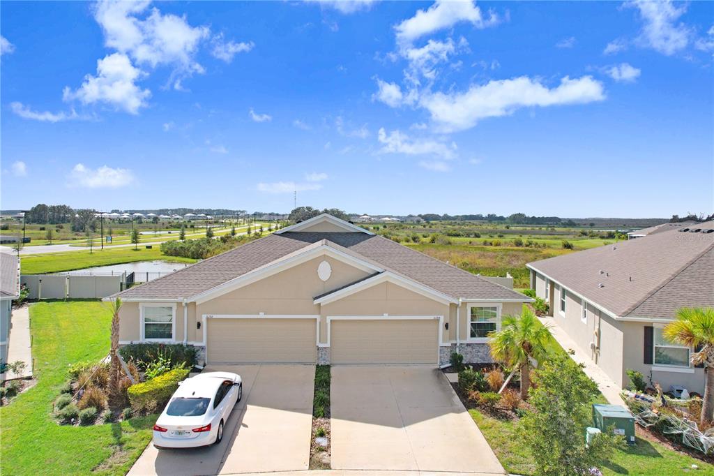 a front view of a house with a ocean view