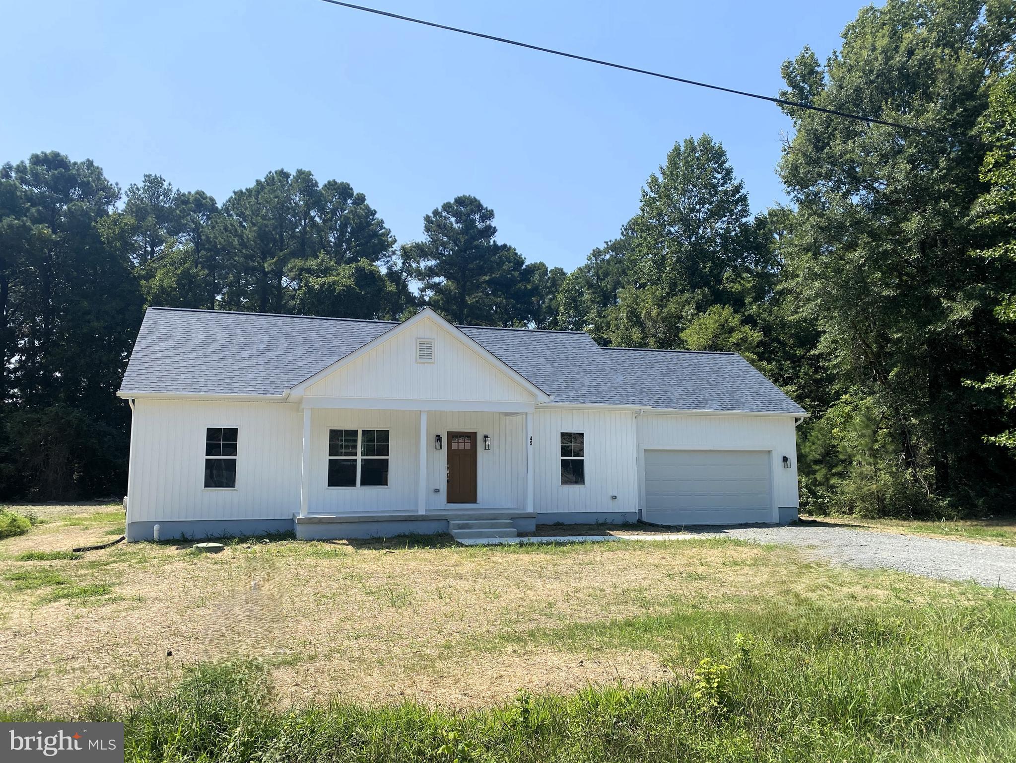 a house with trees in the background