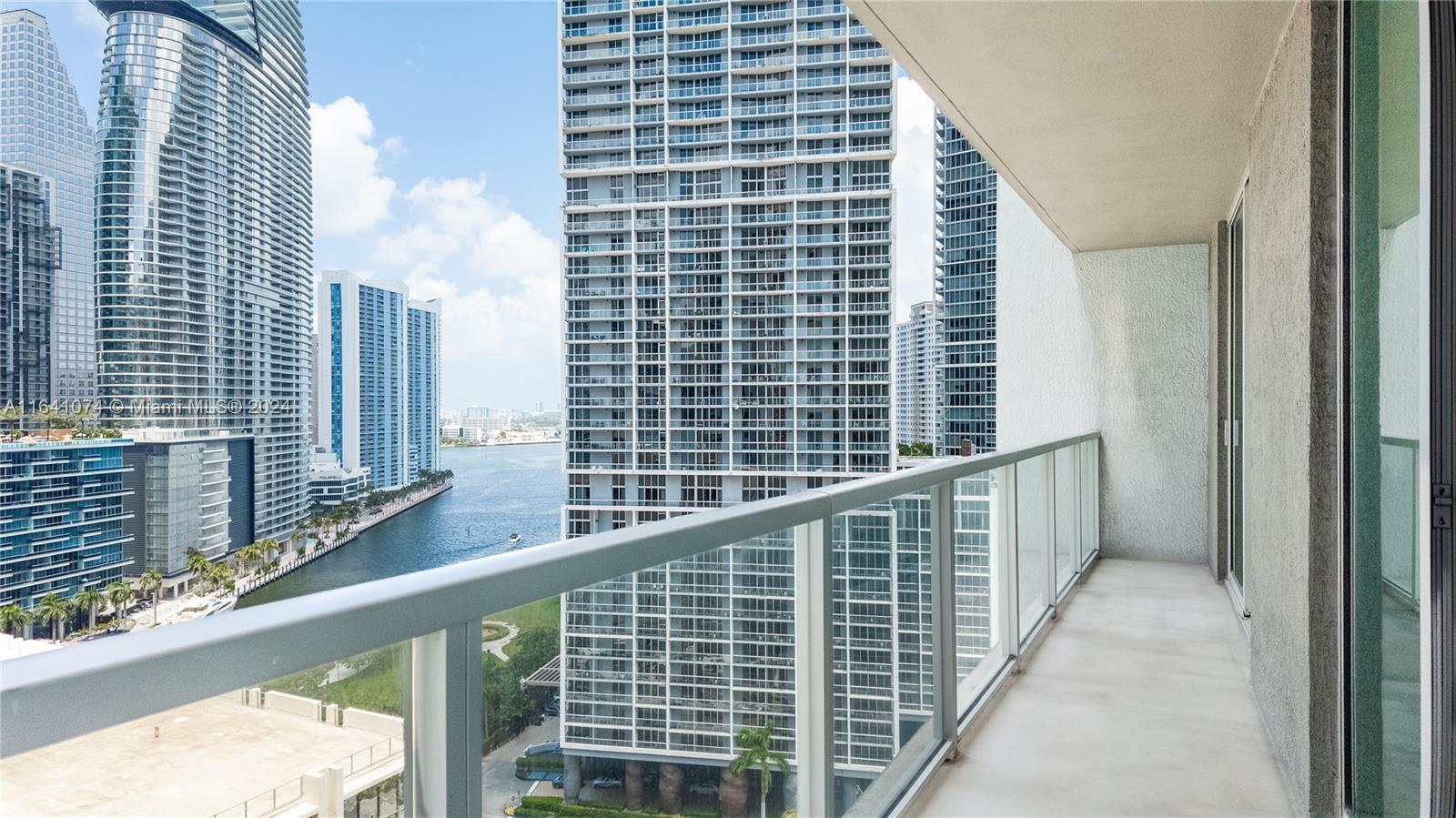 a view of balcony with a couple of windows