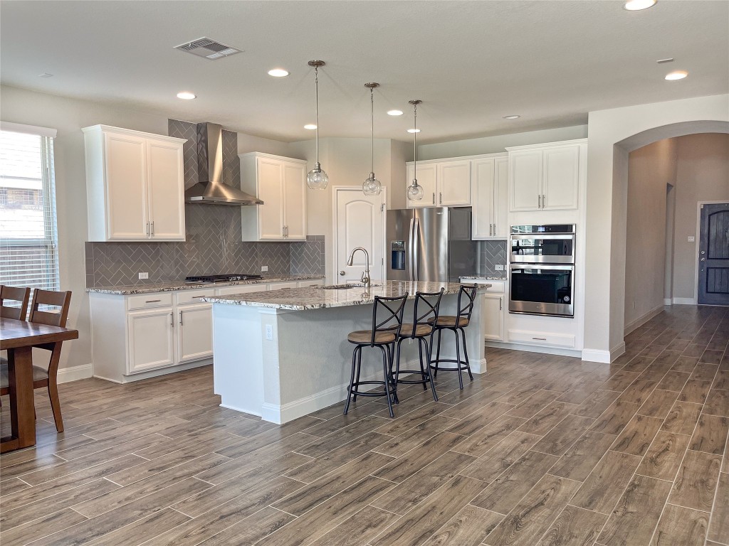 Spacious and open area between kitchen and living