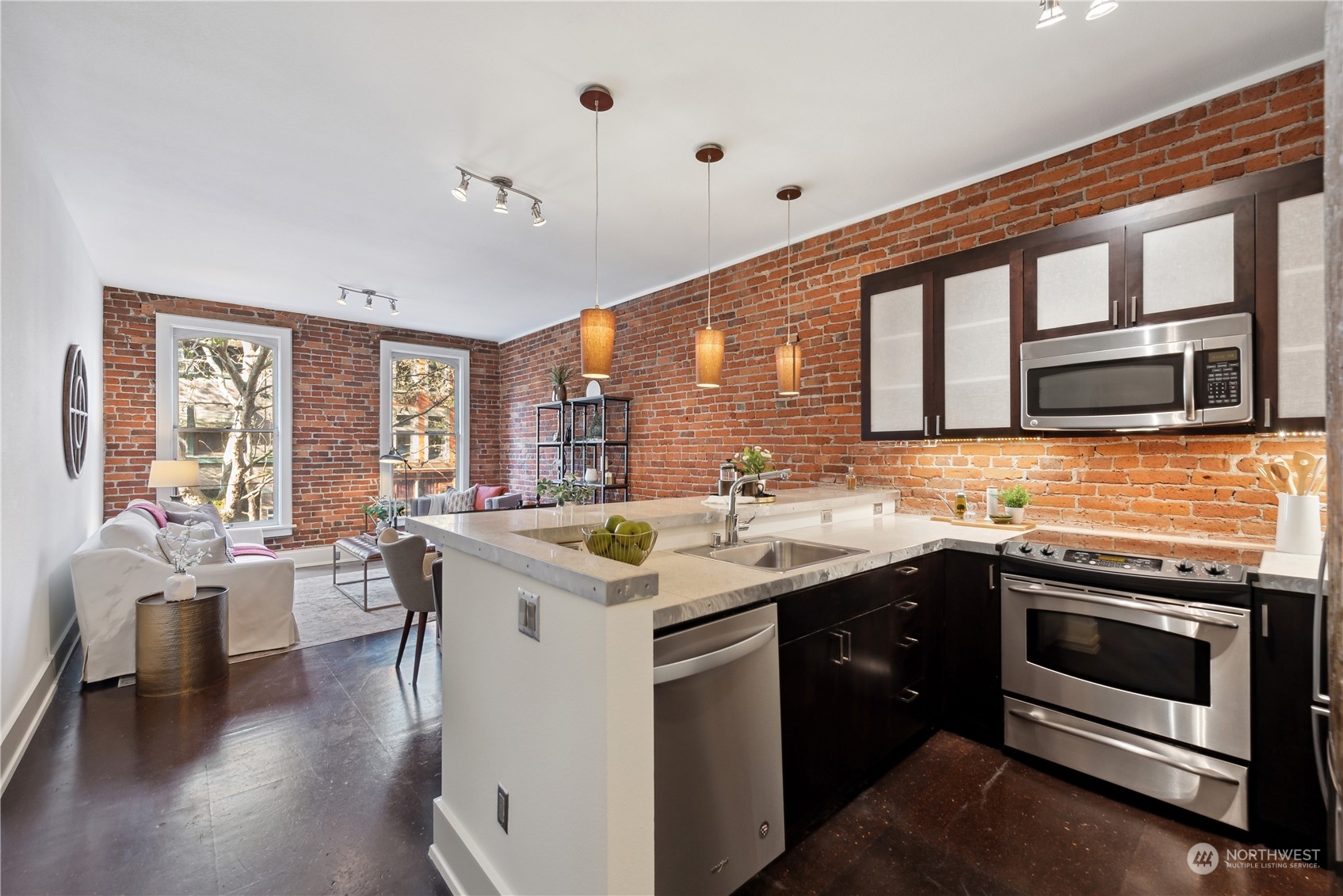 a kitchen with a sink stove and cabinets