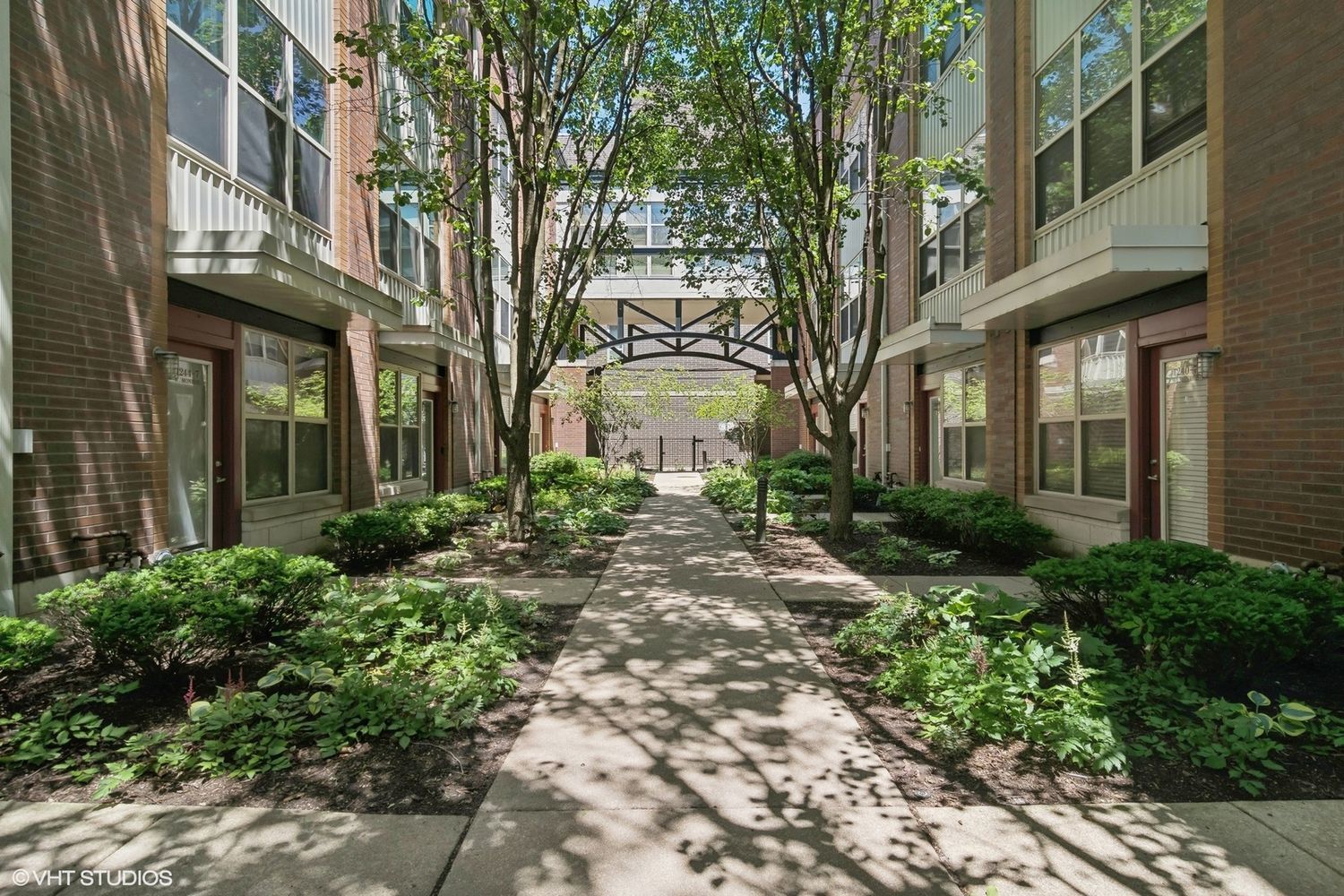 a view of a pathway with a house