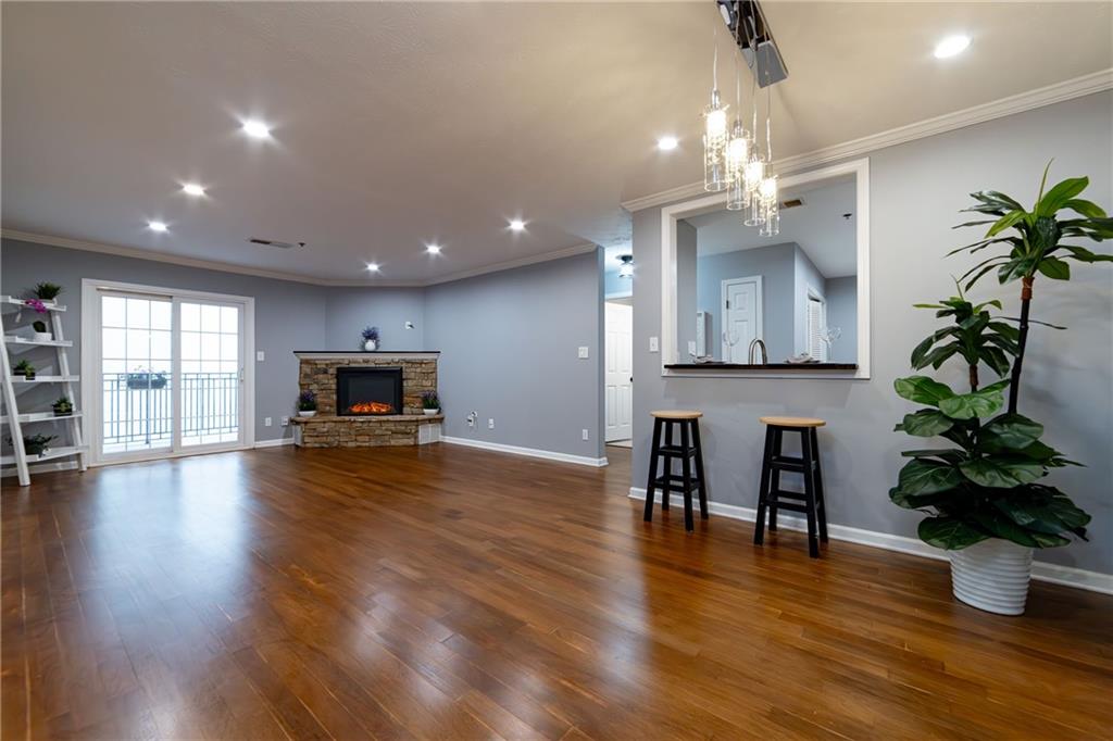 a view of a room with kitchen and dining room