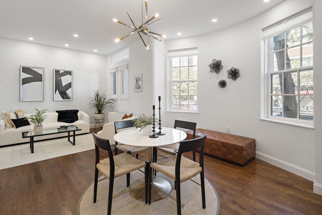 a view of a livingroom with furniture and window