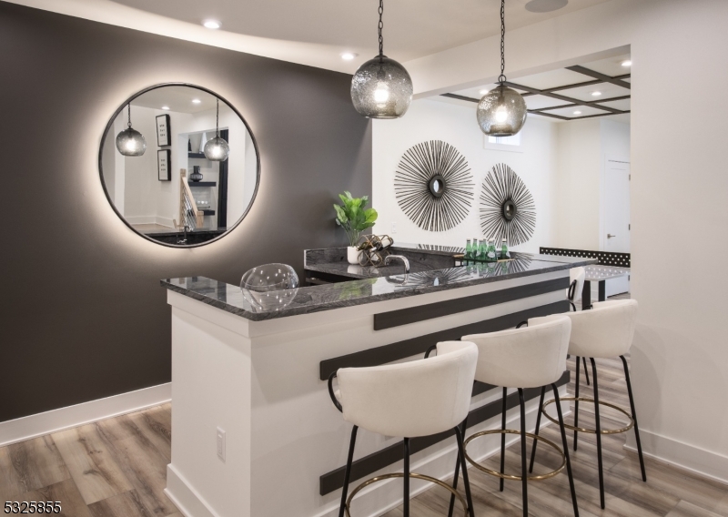 a kitchen with a table and chairs in it