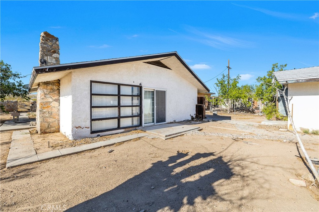 a view of a house with a patio