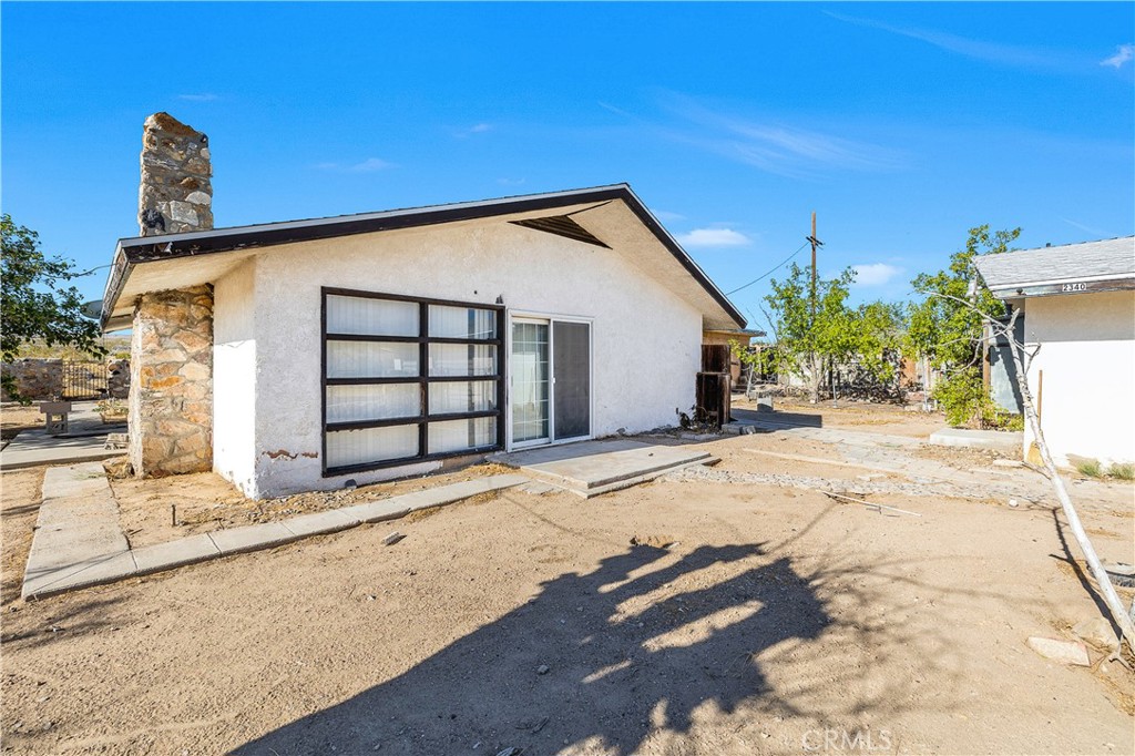 a view of a house with a patio