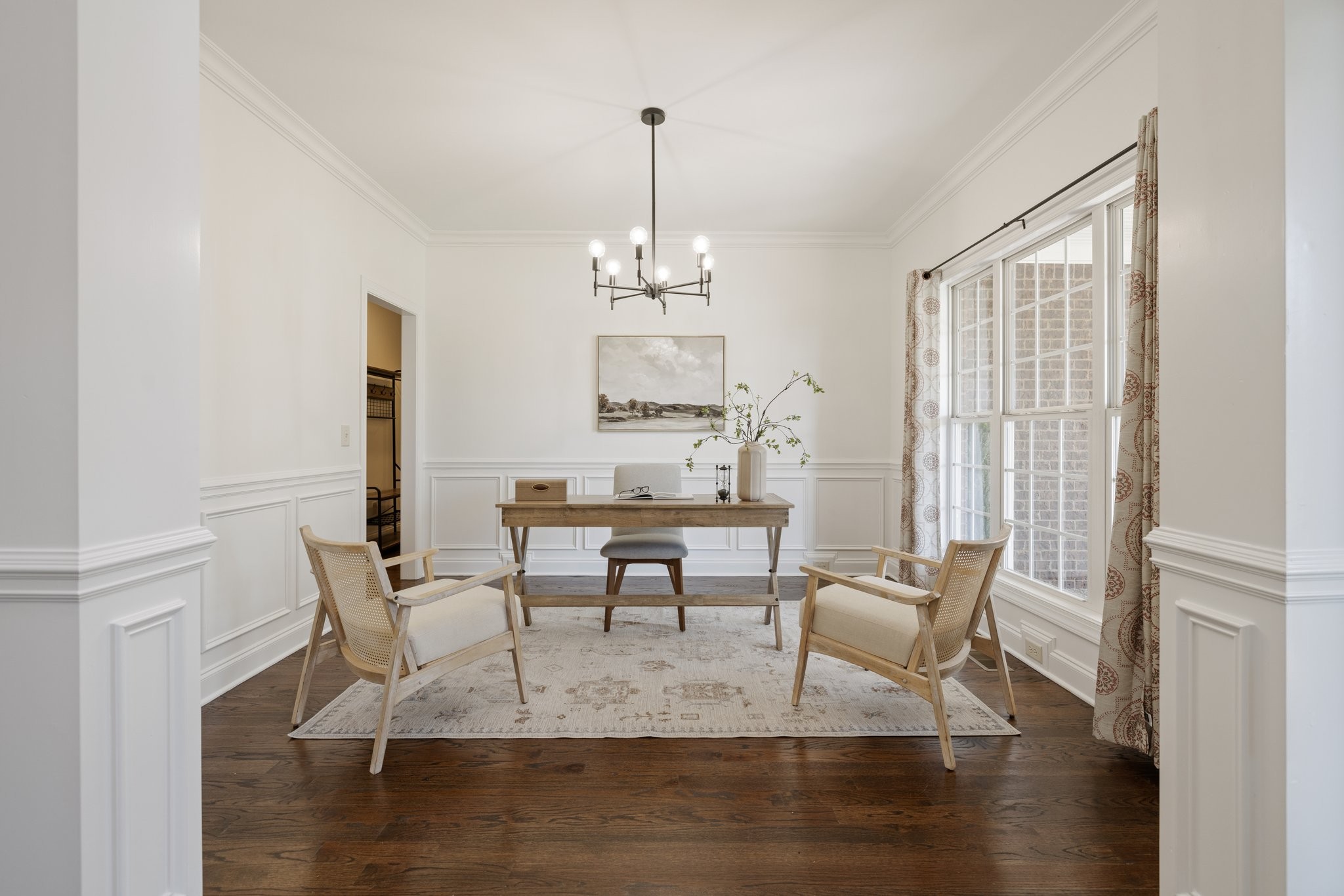 Welcome home! Fresh white paint is the perfect canvas for you to make this space your own. Don't want a home office? This is a great formal dining space, library, or lounge.