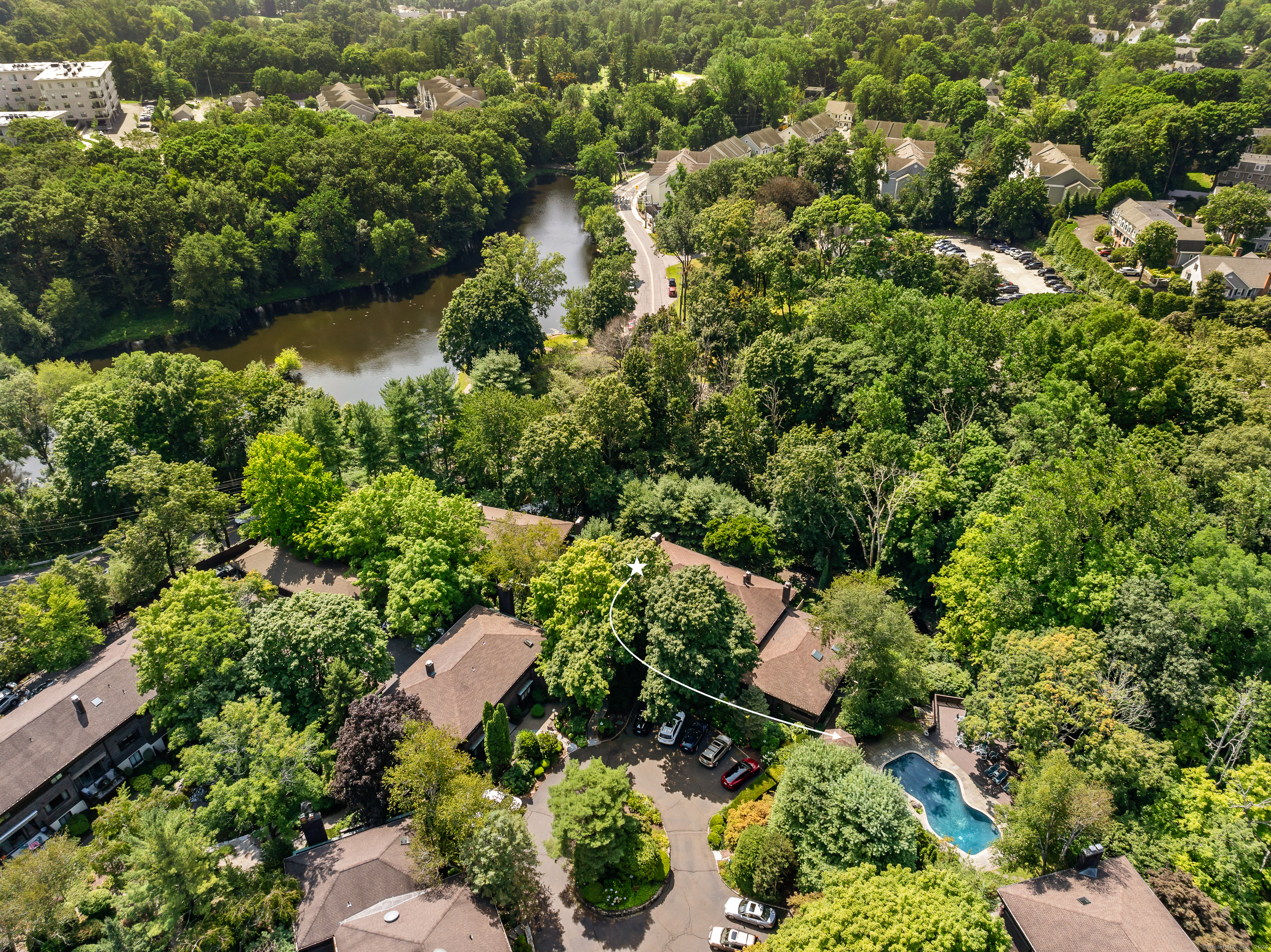 Welcome to Canaan Close. The star shows townhouse and proximity to the pool and to the town of New Canaan and train station.