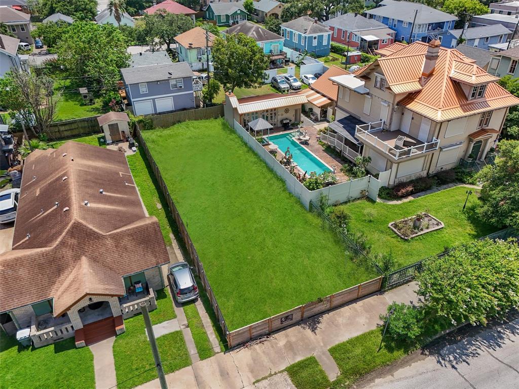 an aerial view of a house with a garden