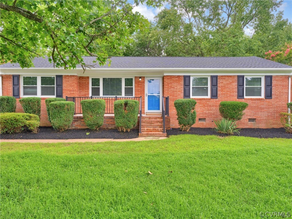 front view of a house with a yard