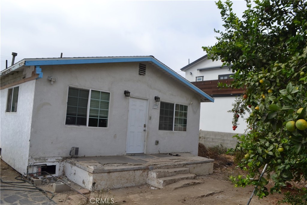 a view of a house with a patio