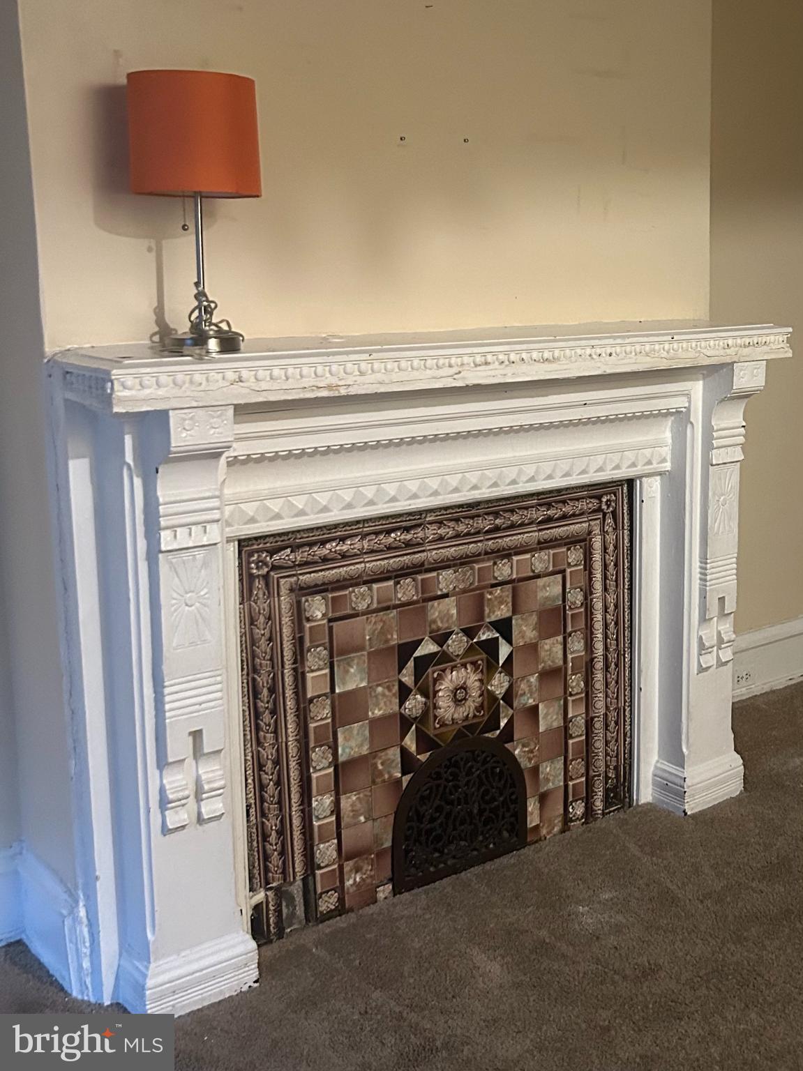 a view of a livingroom with a fireplace