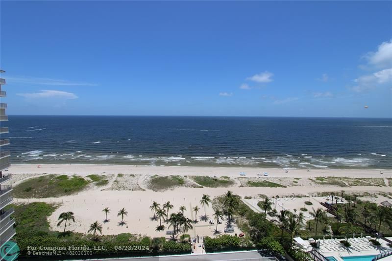 a view of beach and an ocean