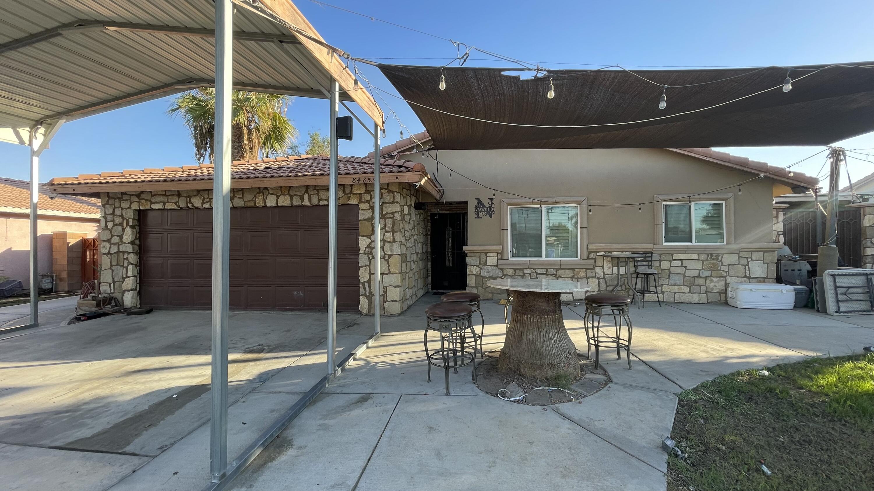 a view of a house with patio